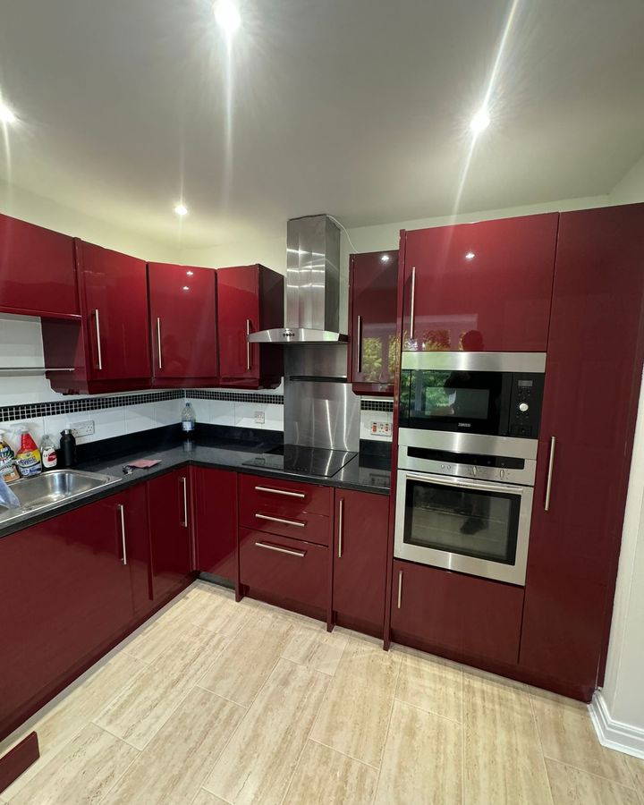 Before: burgundy high-gloss doors